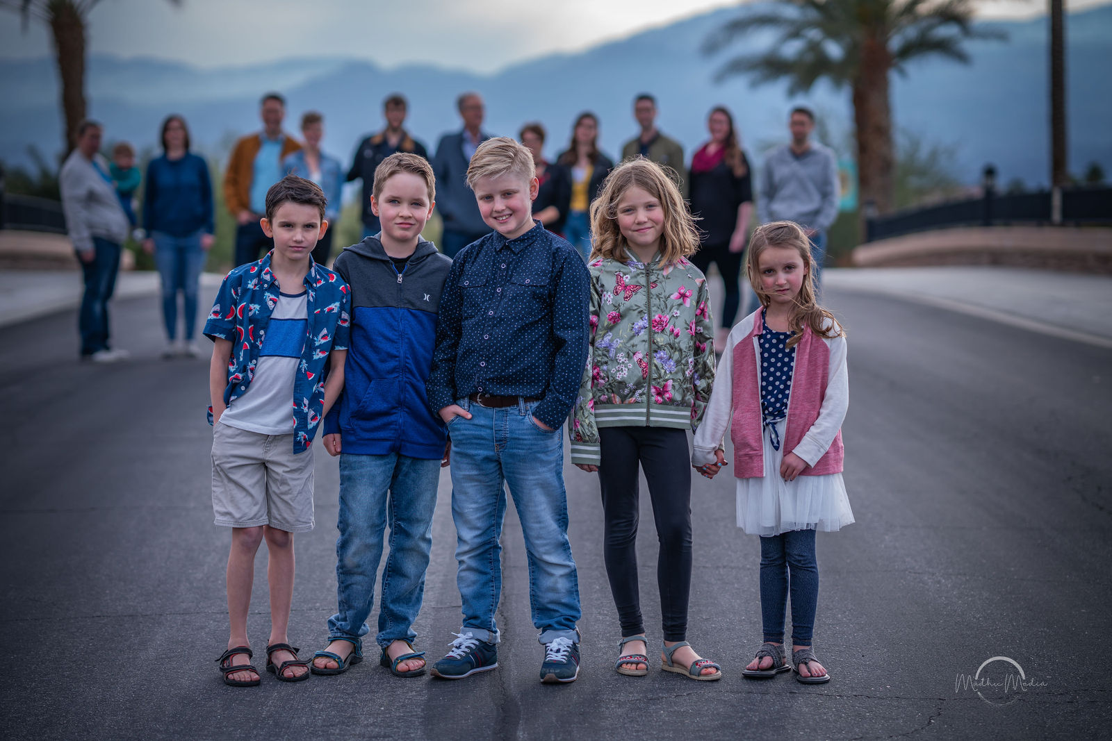 The kids lined up for a portrait on the boulevard
